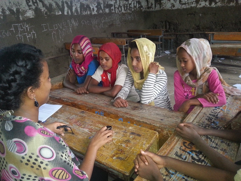Researchers speak with young girls about menstruation